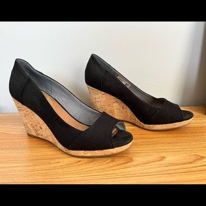 Tom’s black wedges size 8.